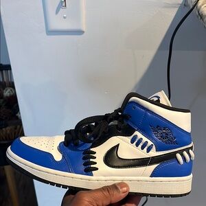 Air Jordan 1 Mid Royal Blue and White Sneakers
